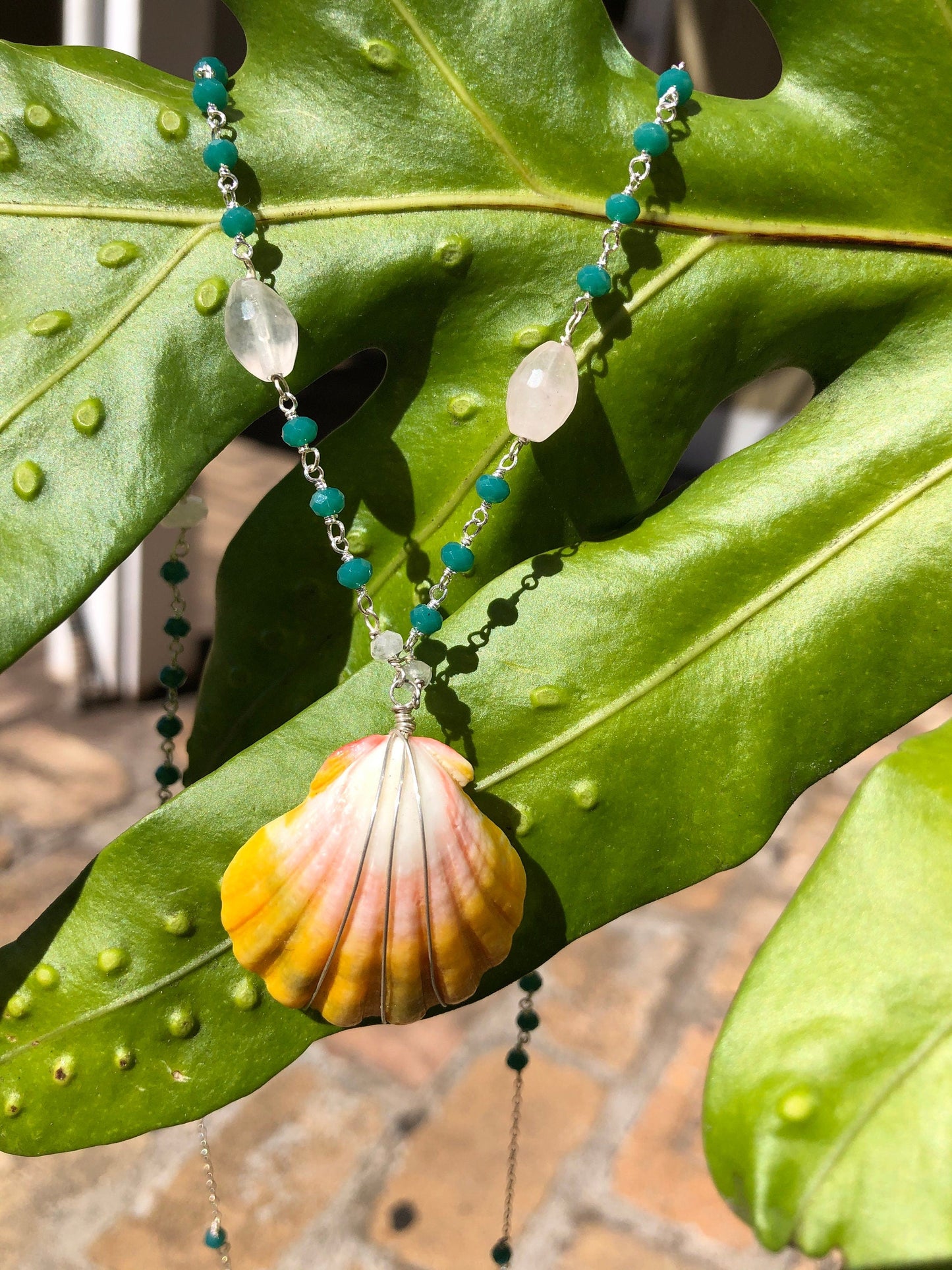 Sunrise shell necklace with green onyx, rose quartz, and white chalcedony