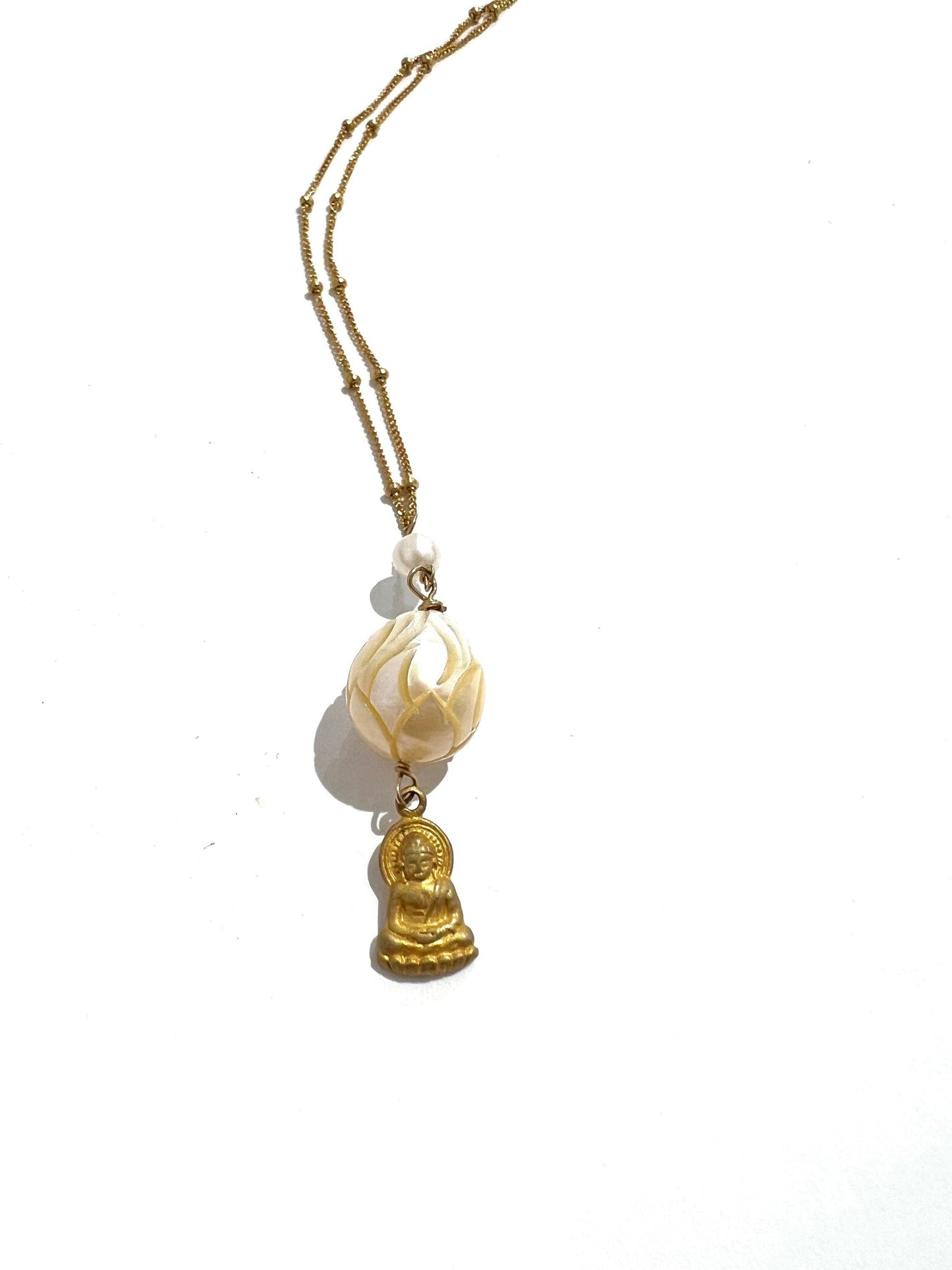 Carved pearl with Buddha necklace