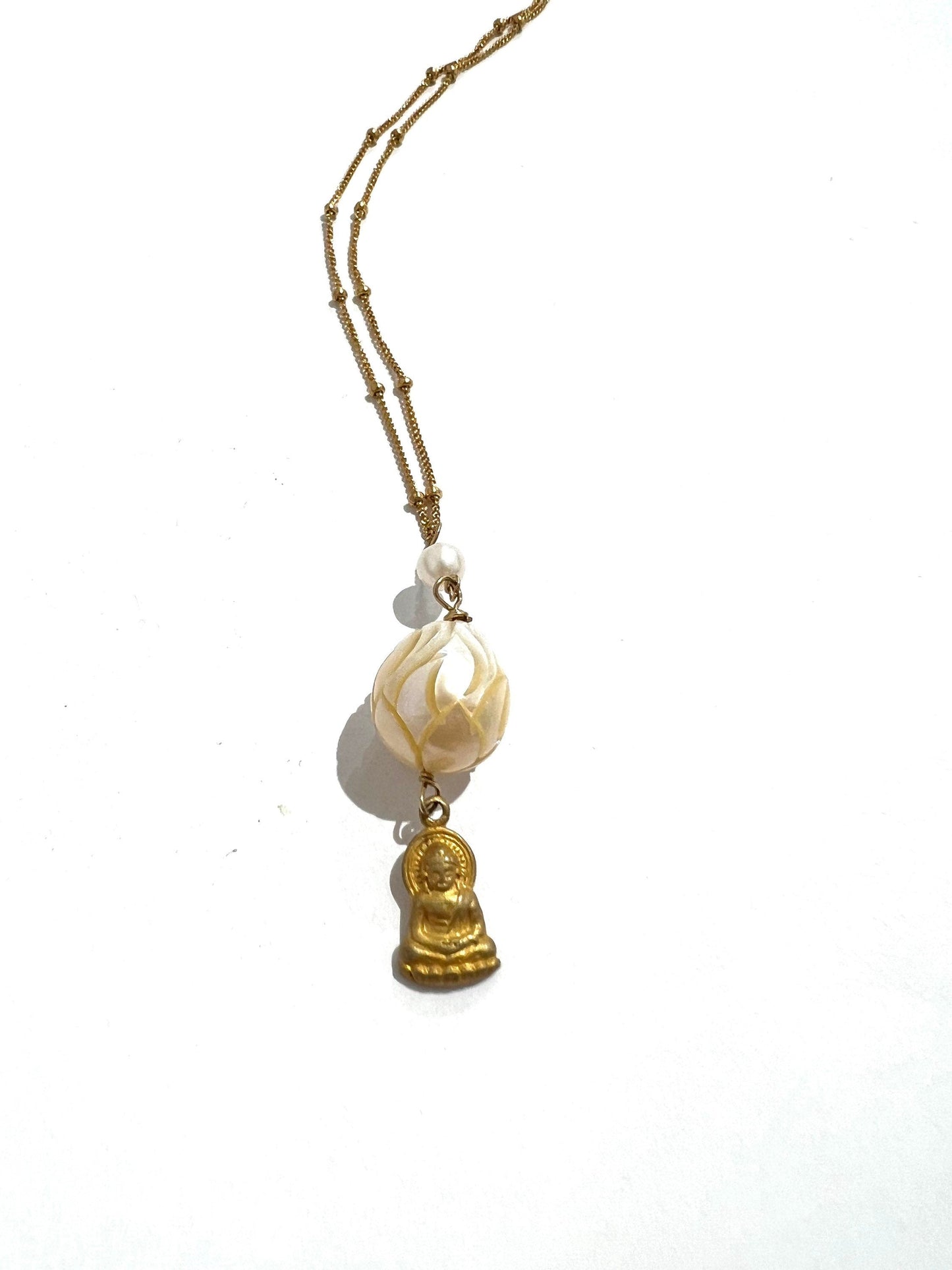 Carved pearl with Buddha necklace