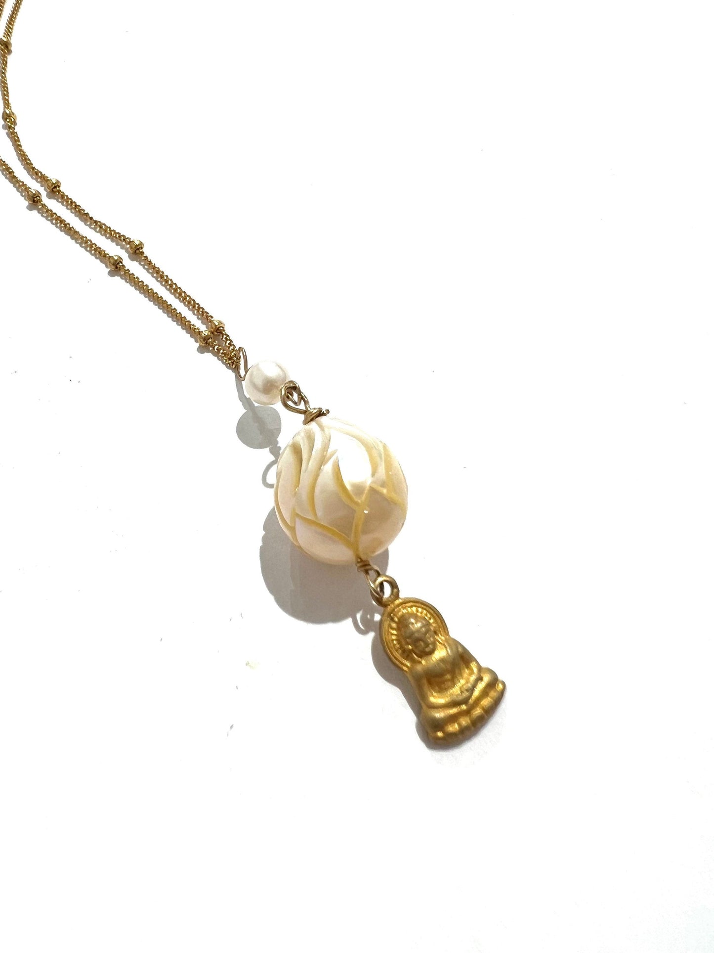 Carved pearl with Buddha necklace