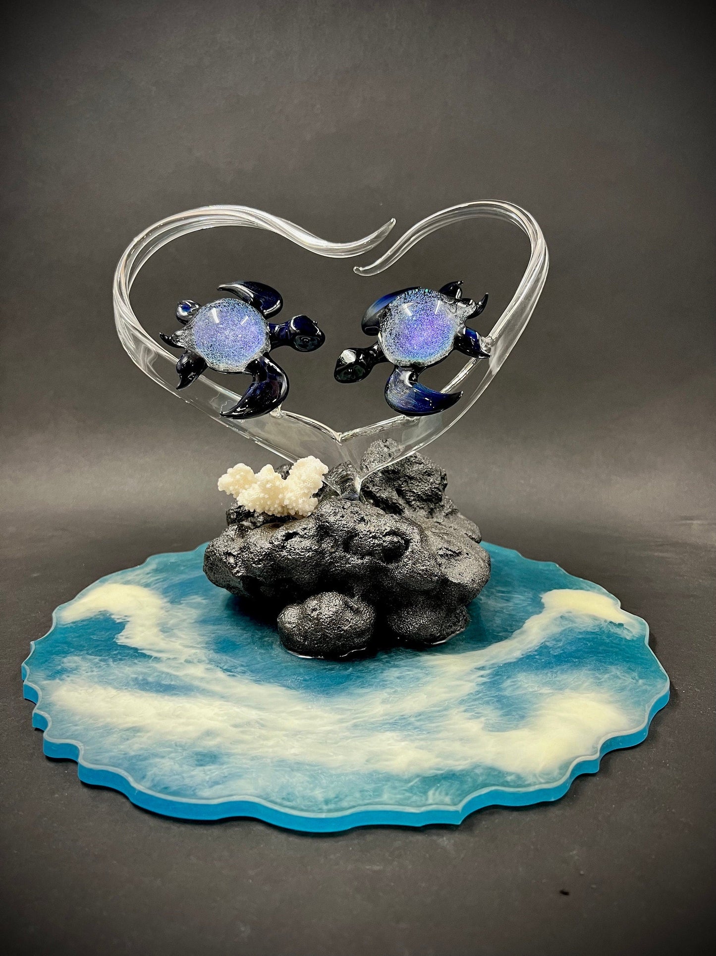 Dichroic turtle lovers in a heart glass sculpture