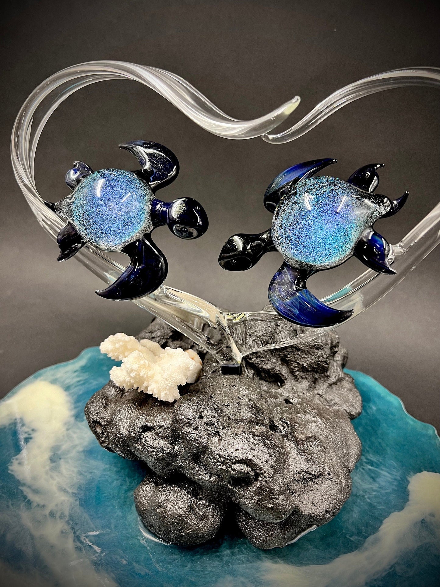 Dichroic turtle lovers in a heart glass sculpture
