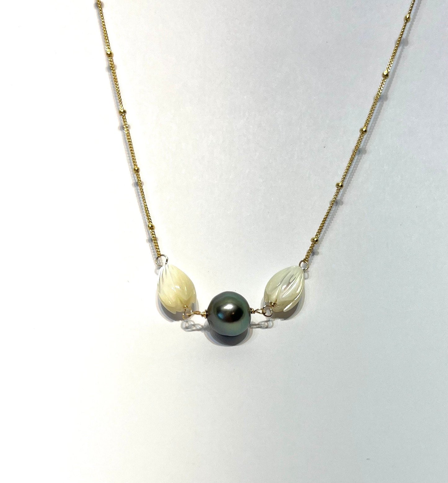 Bloom from the ashes Mother of pearl pikake and Tahitian pearl necklace