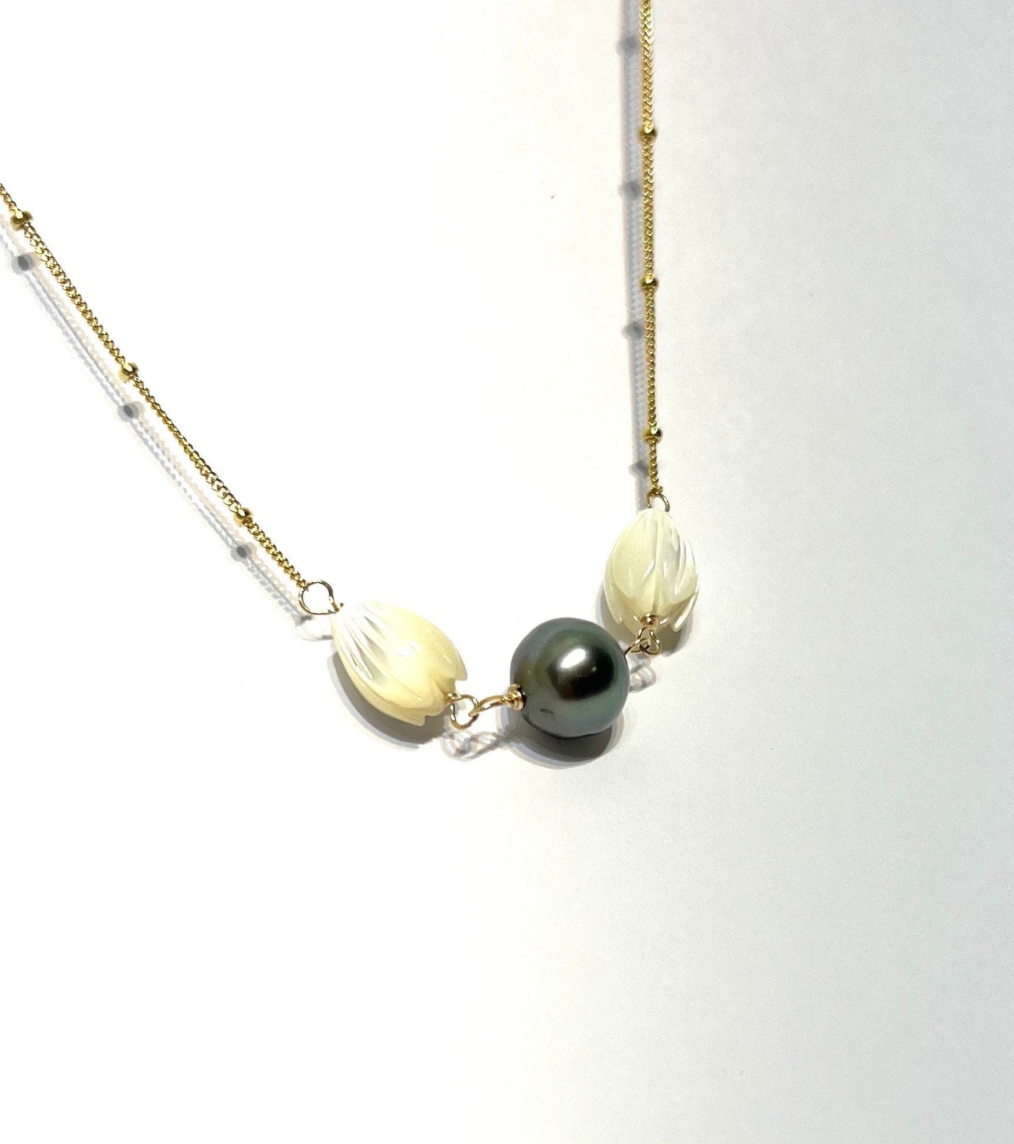 Bloom from the ashes Mother of pearl pikake and Tahitian pearl necklace