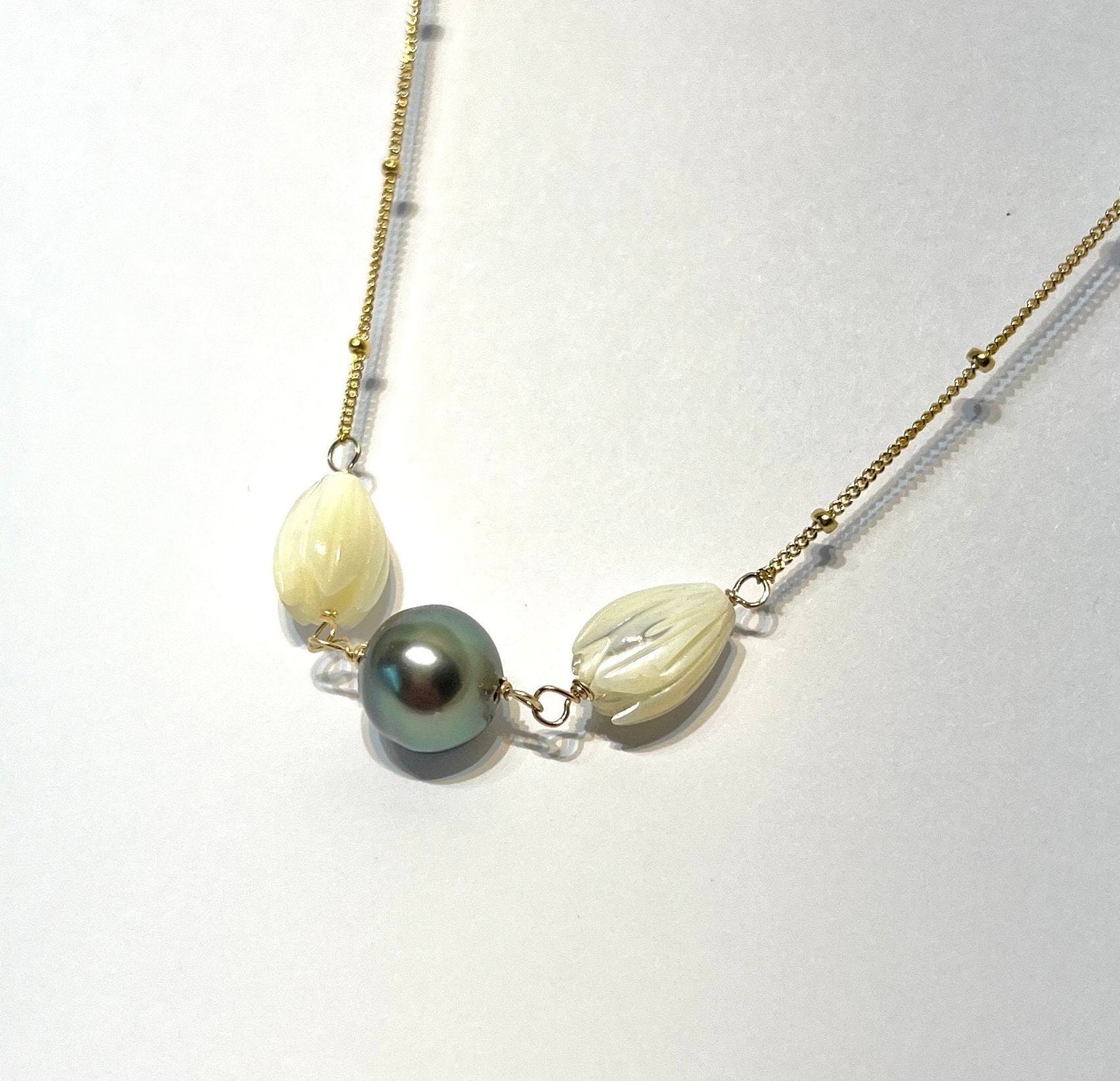 Bloom from the ashes Mother of pearl pikake and Tahitian pearl necklace