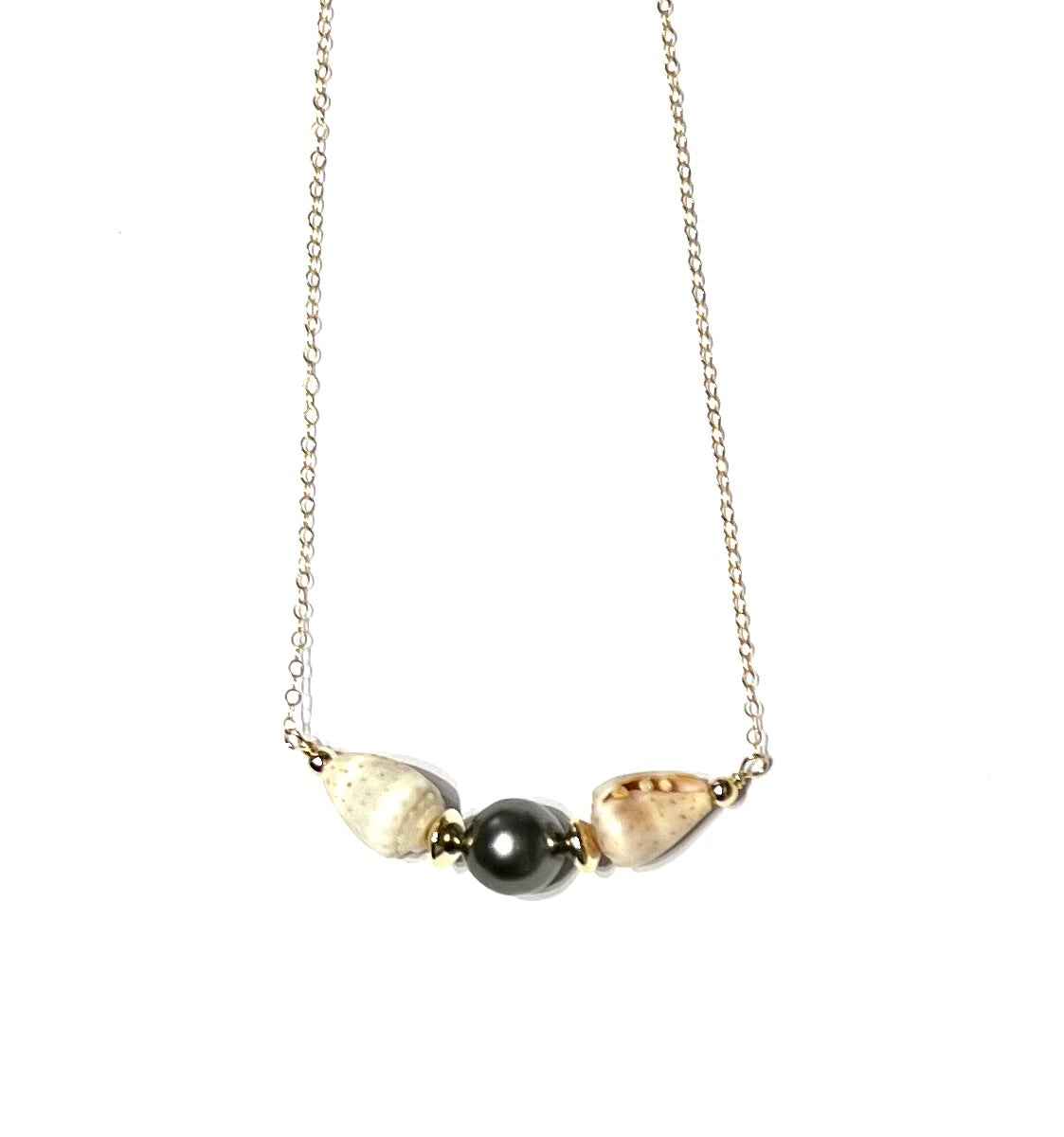 Cone shell and Tahitian pearl necklace