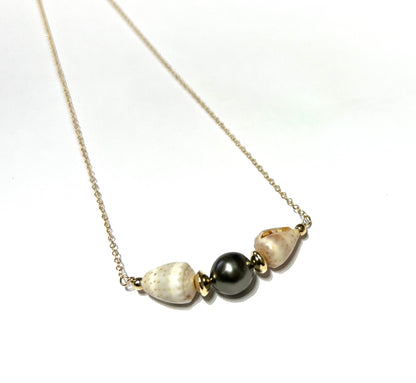 Cone shell and Tahitian pearl necklace