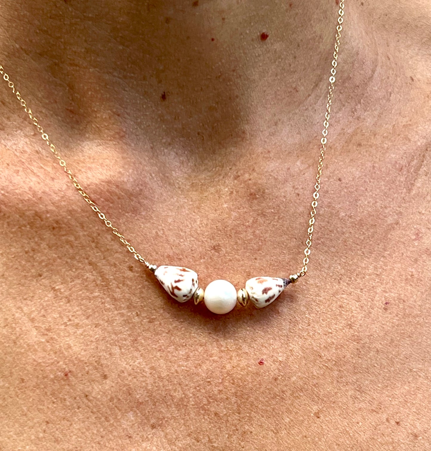 Cone shell and Edison pearl necklace