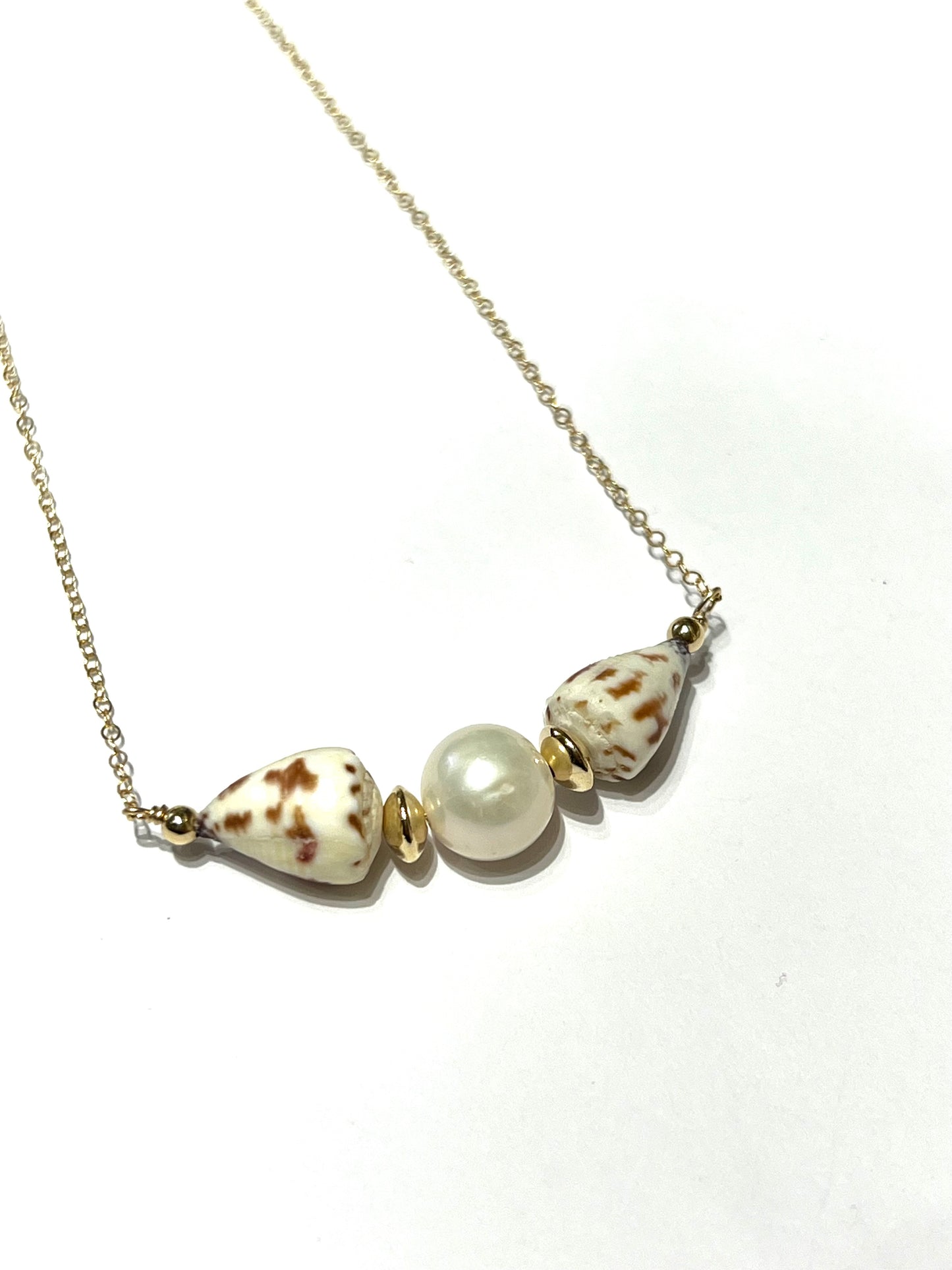 Cone shell and Edison pearl necklace