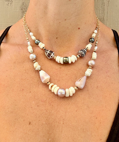 Pink Edison pearls, cone shells, and puka shells necklace