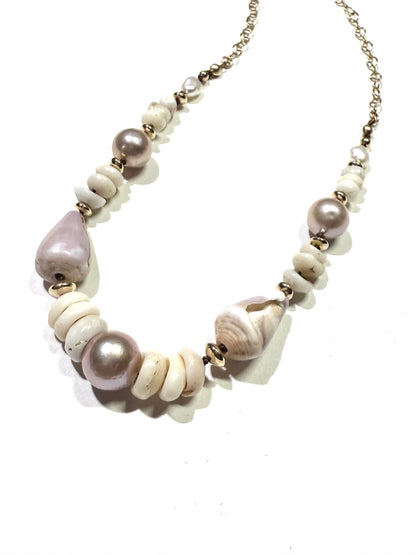 Pink Edison pearls, cone shells, and puka shells necklace