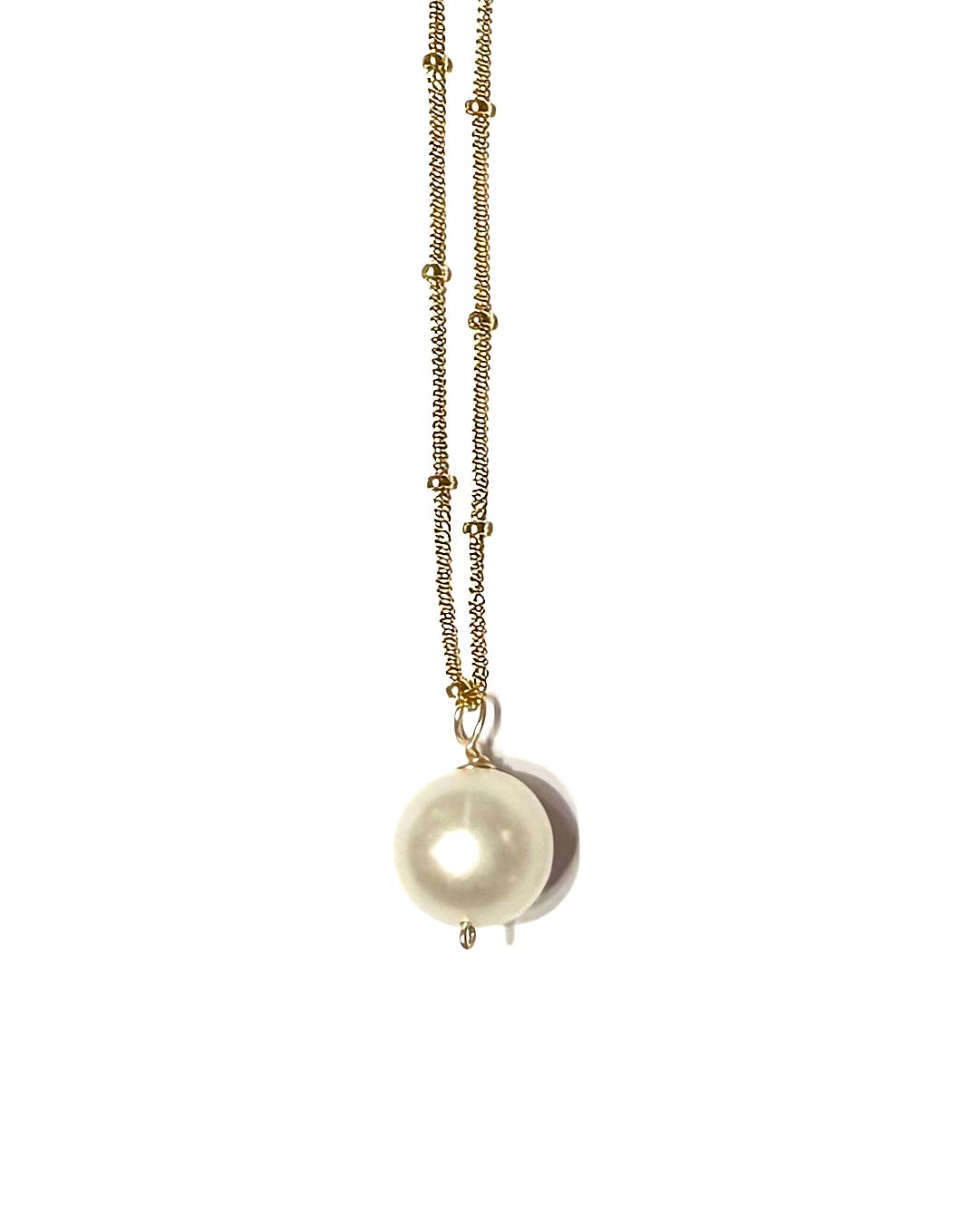 Tahitian pearl or Edison pearl necklace in satellite chain