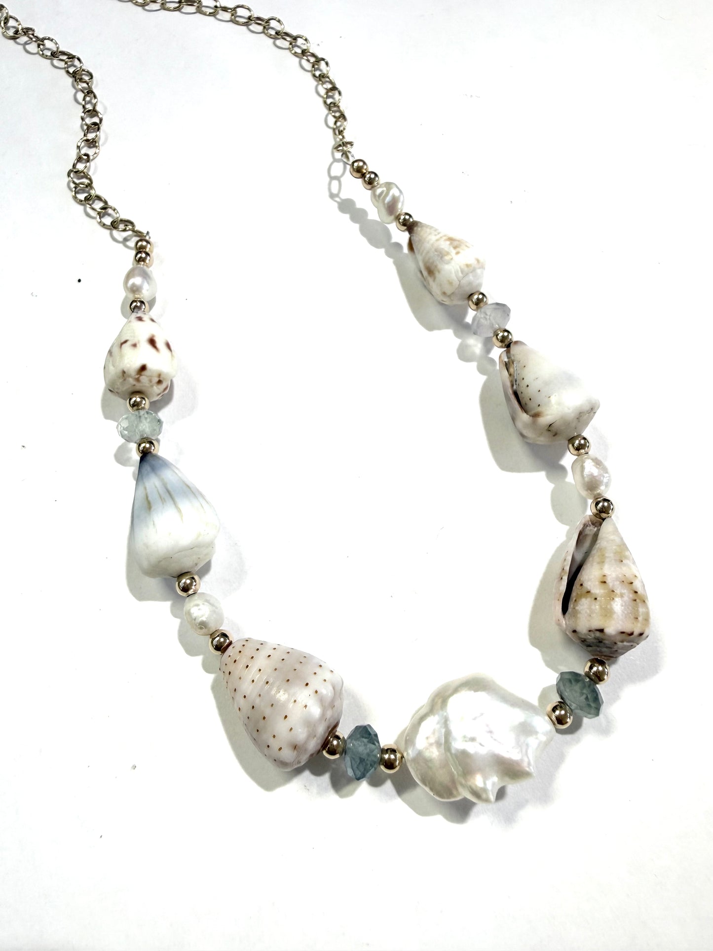Cone shells, fluorite,and fresh water keshi Pearls necklace