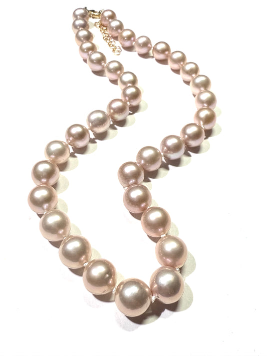 Pink Edison Pearl silk knotted strand