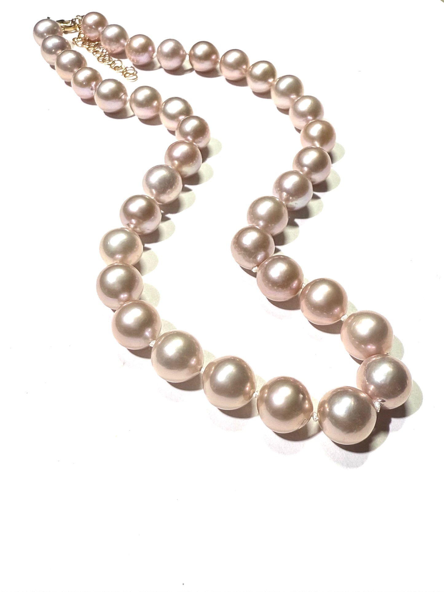 Pink Edison Pearl silk knotted strand
