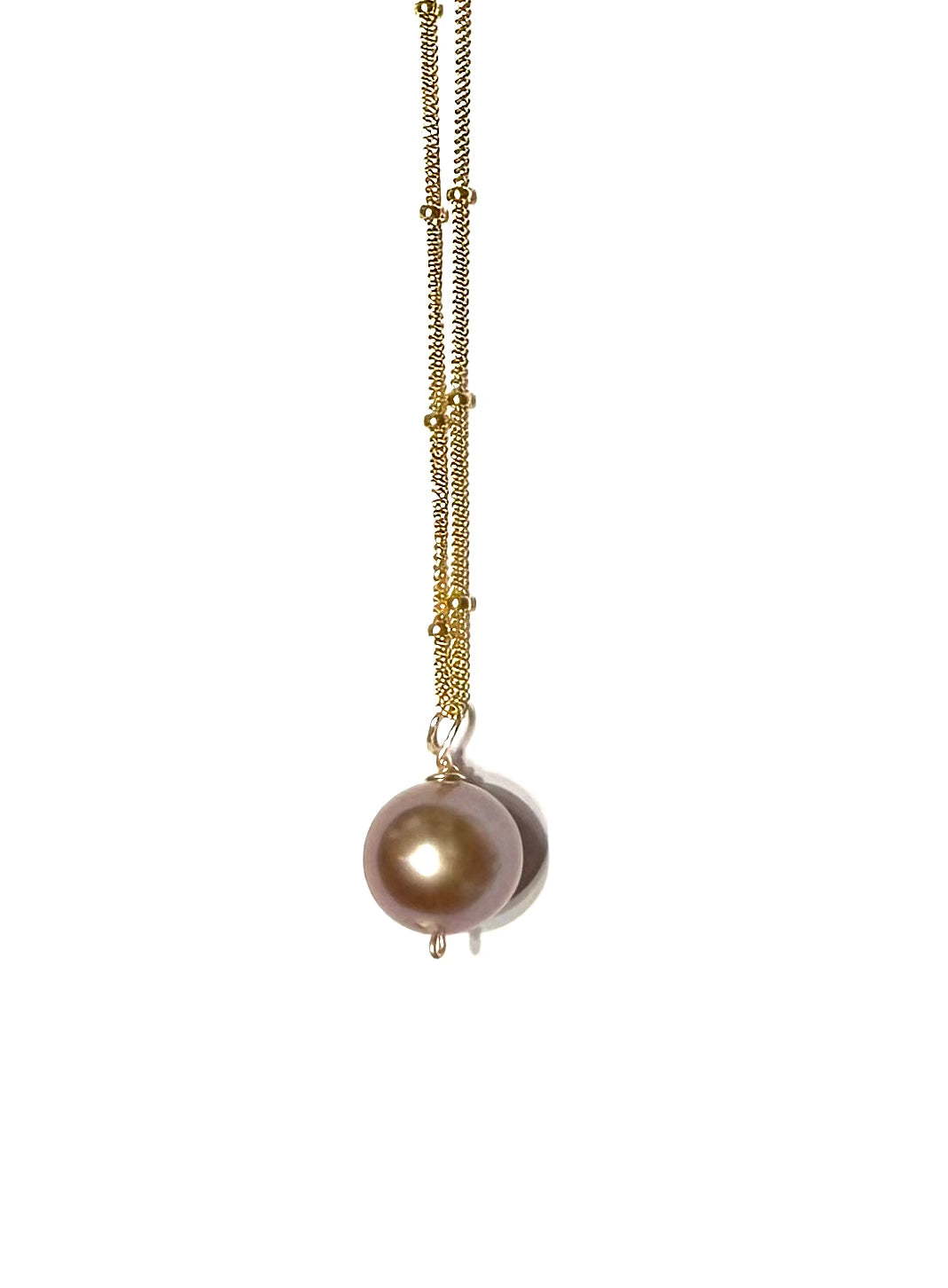 Tahitian pearl or Edison pearl necklace in satellite chain