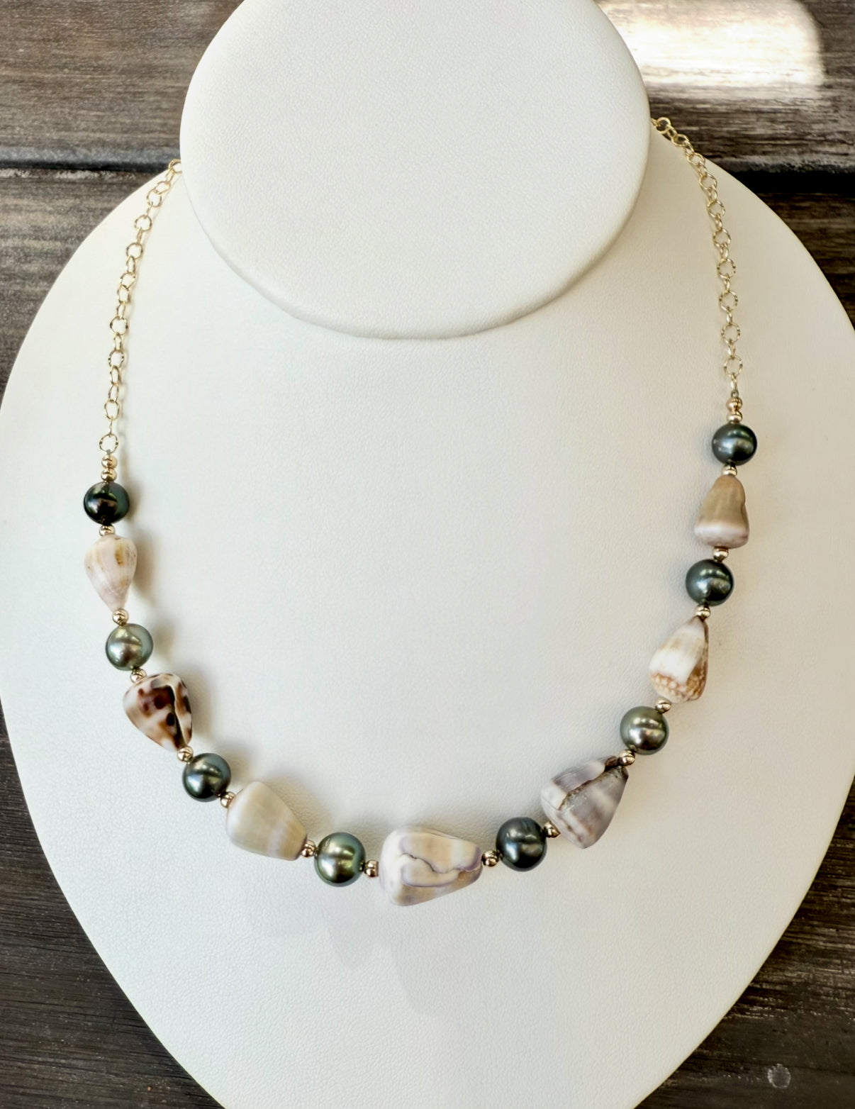 Cone shells and Tahitian Pearls necklace