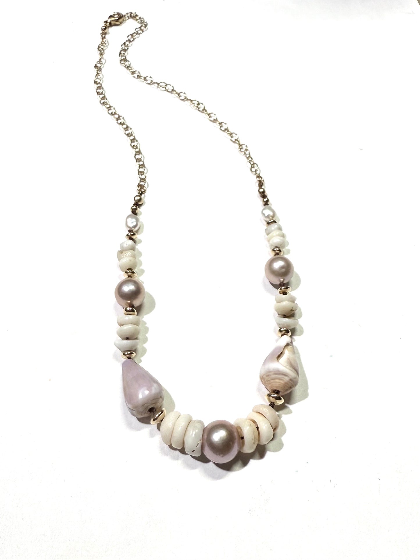 Pink Edison pearls, cone shells, and puka shells necklace