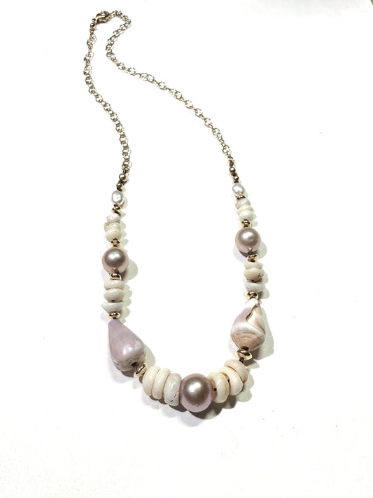 Pink Edison pearls, cone shells, and puka shells necklace