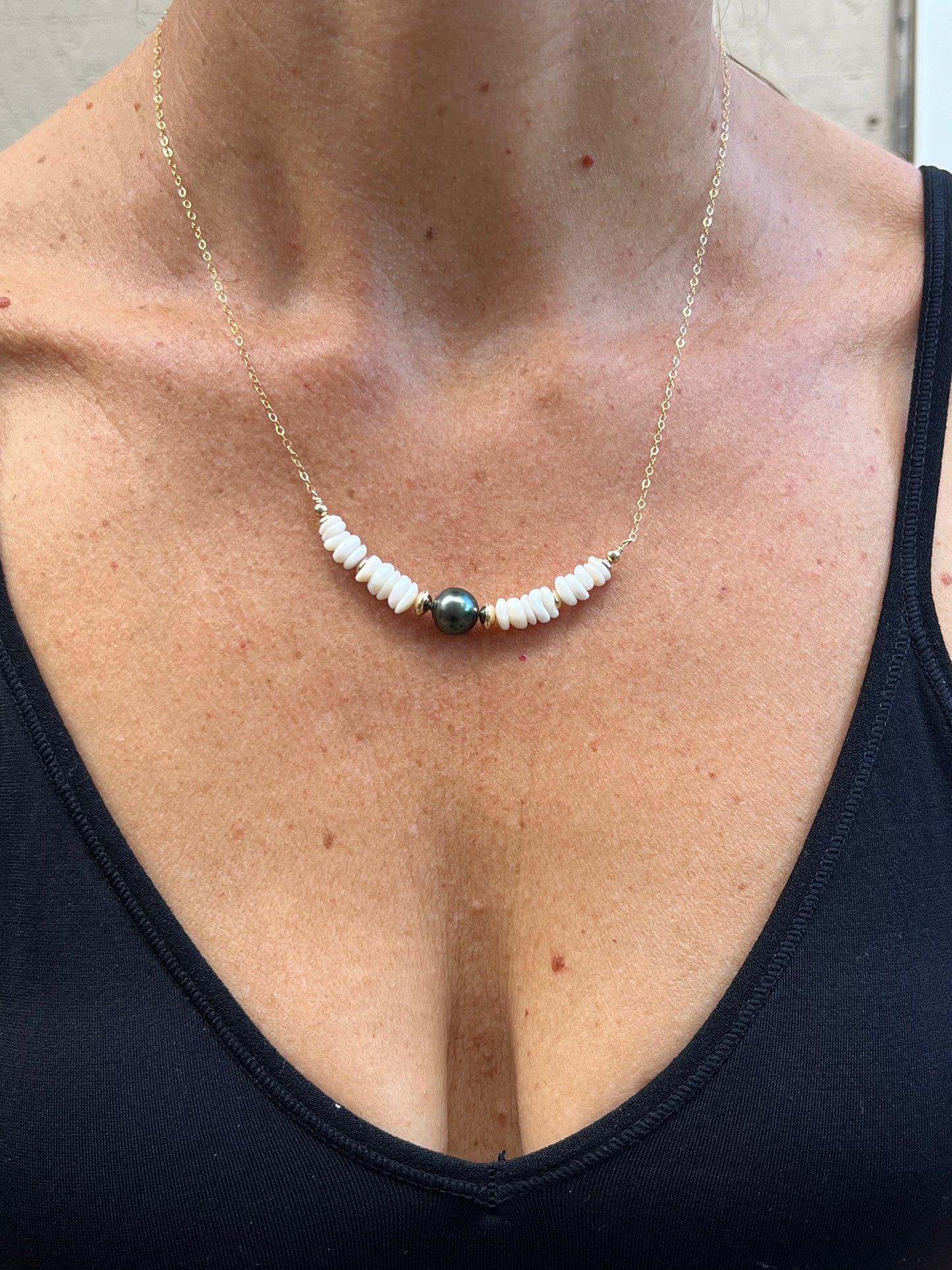 Puka shells and Tahitian pearl necklace