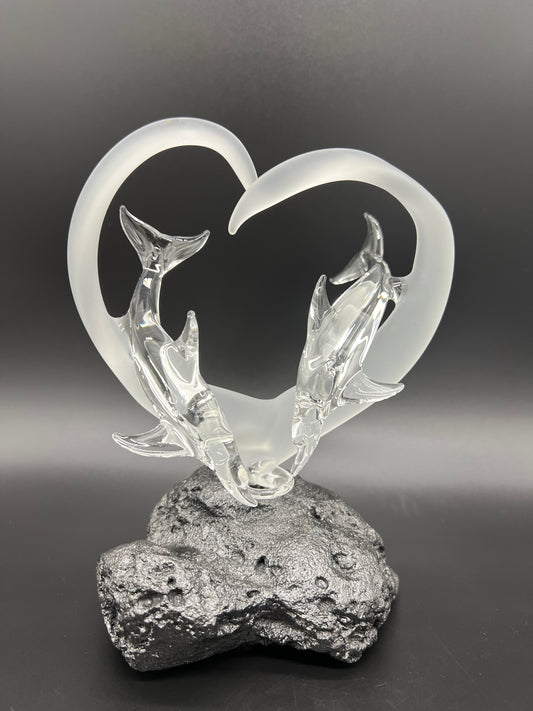 Dolphin lovers in a frosted heart glass sculpture