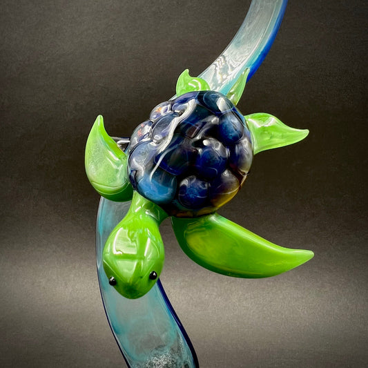 Turtle on aqua seaweed glass sculpture