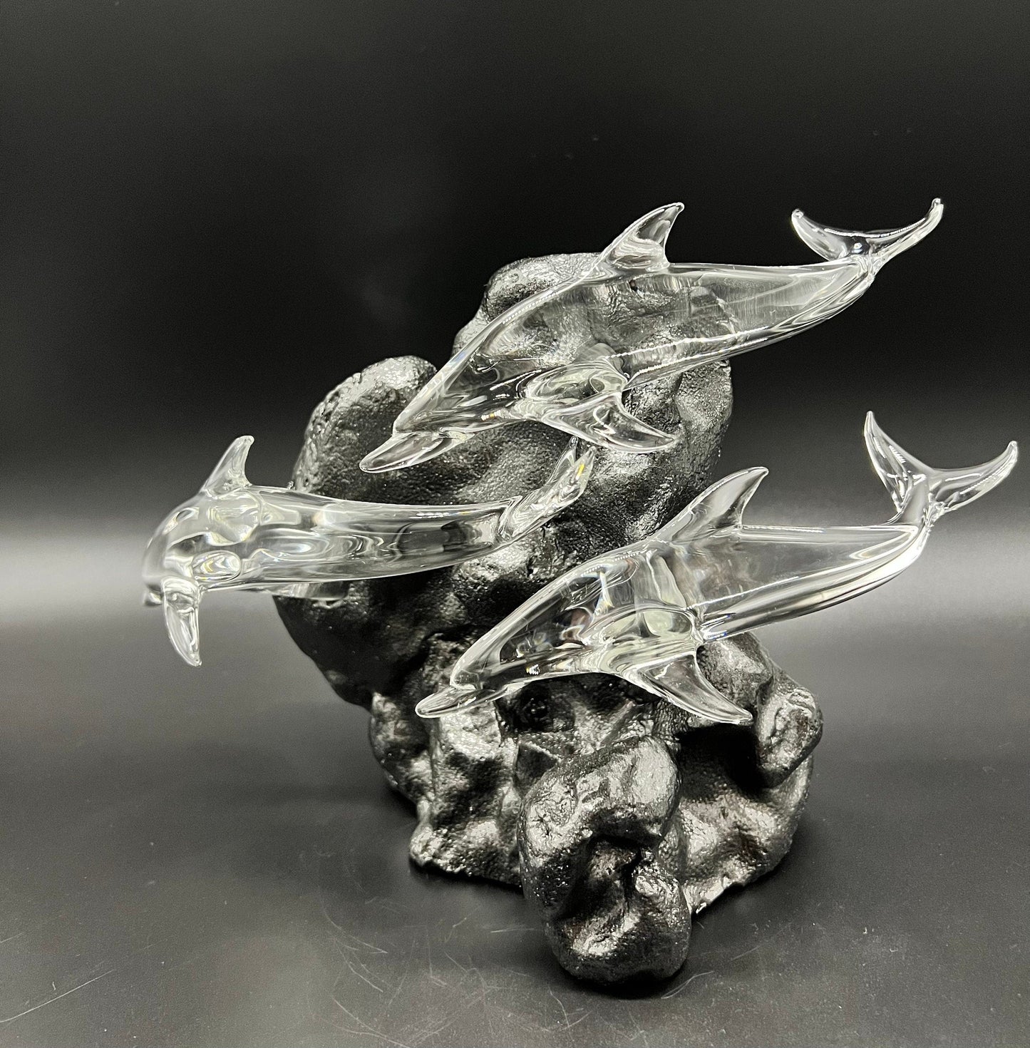 Triple dolphin glass sculpture